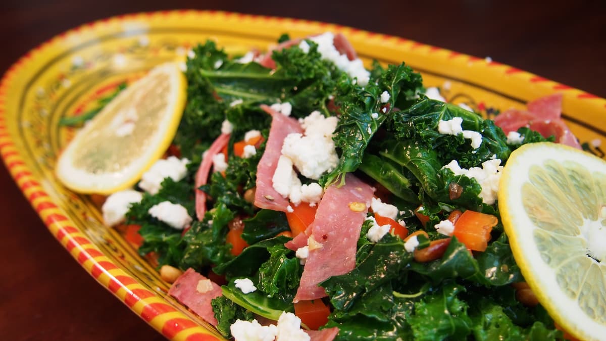 Warm Kale Salad with Pine Nuts, Feta, and Red Pepper